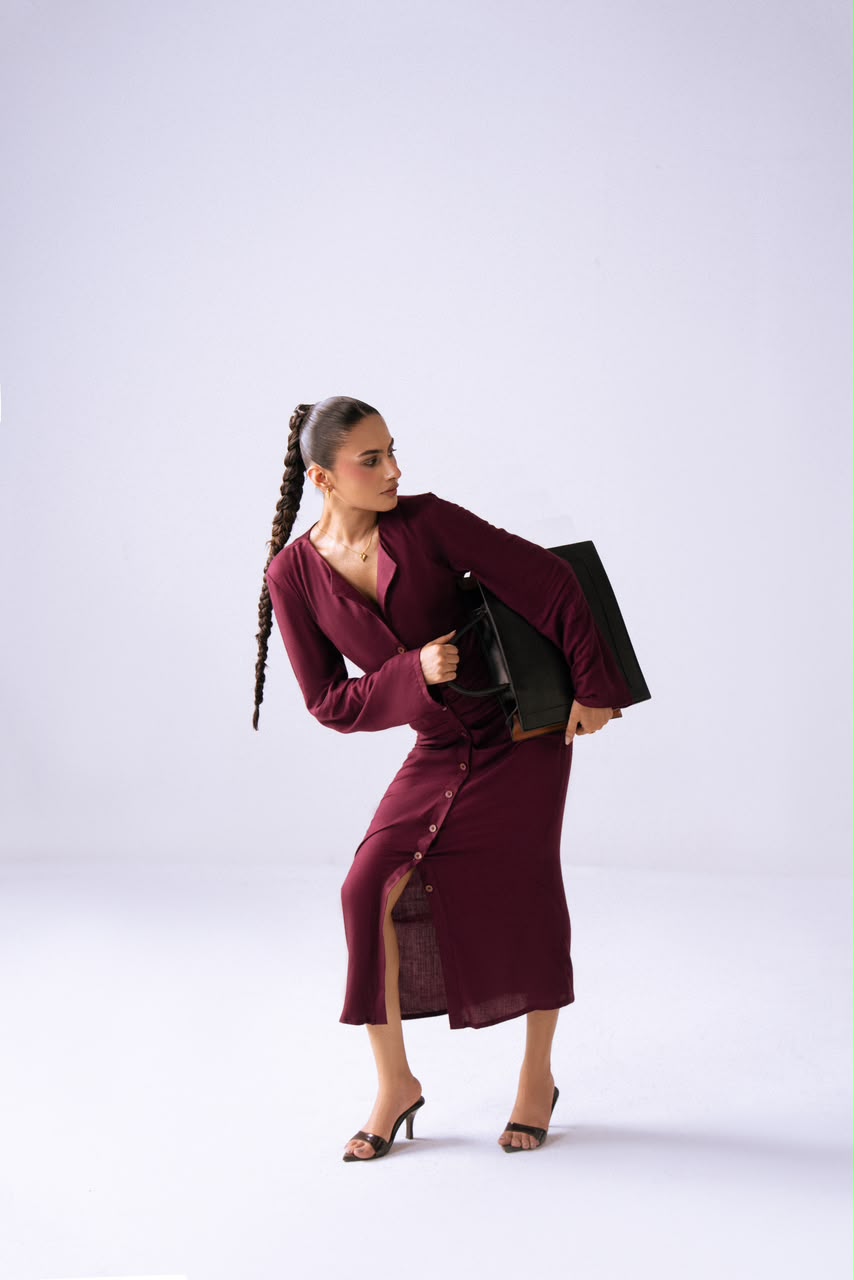 The After Hours Dress - dynamic pose with bag