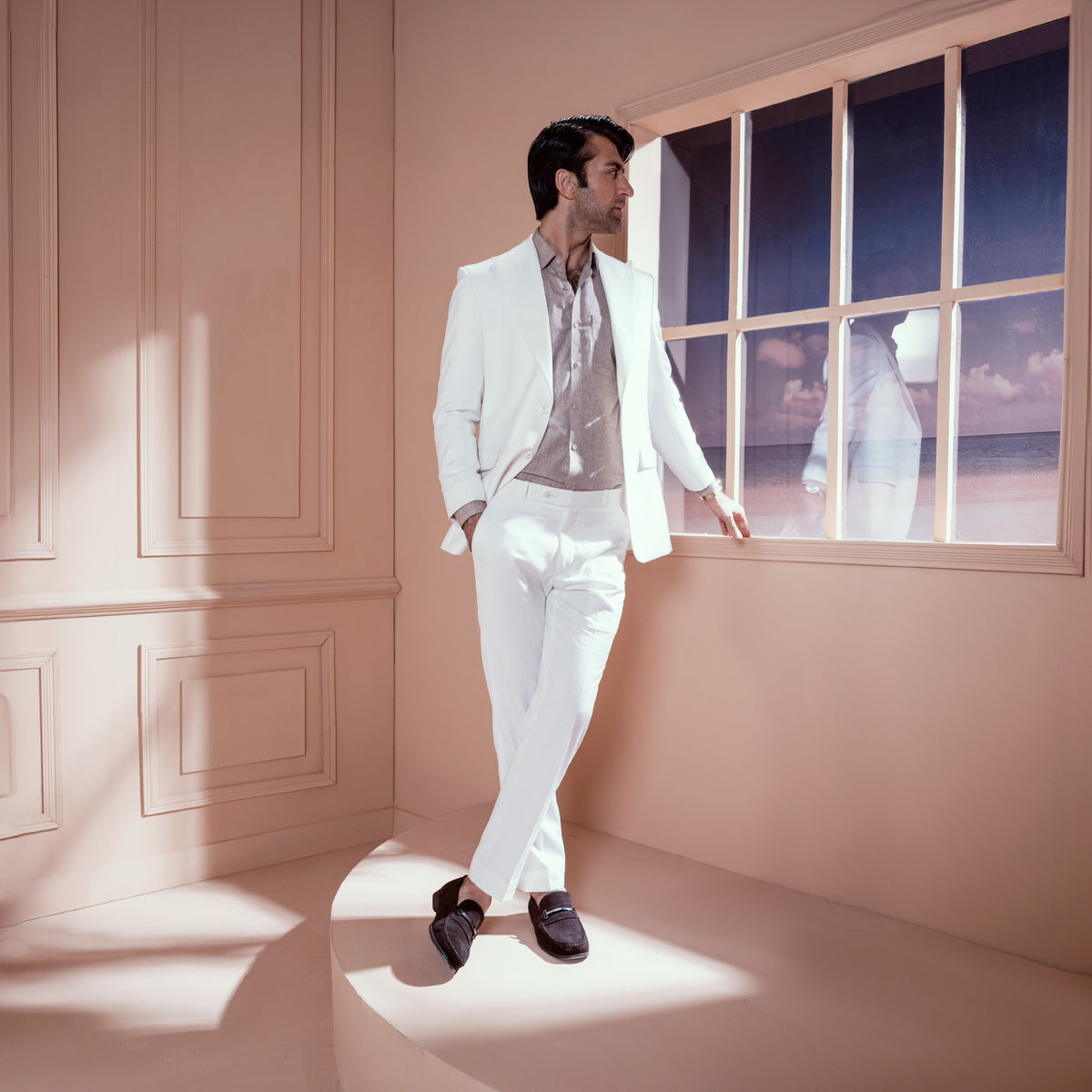 Ivory Bespoke Suit - Seated dynamic pose