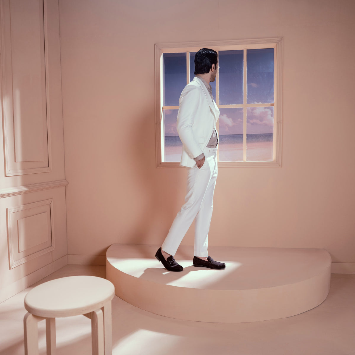 Ivory Bespoke Suit - Standing by window side view